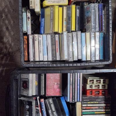 Sale Photo Thumbnail #159: Huge cassette CD and 8-track cartridge lot. 
Receive everything pictured. 
Great Artists such as Elvis, U2, Van Halen and many more.