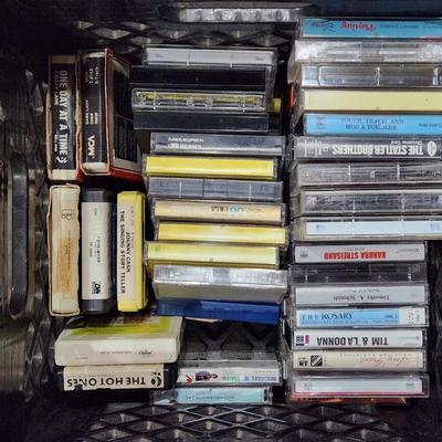 Sale Photo Thumbnail #162: Huge cassette CD and 8-track cartridge lot. 
Receive everything pictured. 
Great Artists such as Elvis, U2, Van Halen and many more.
