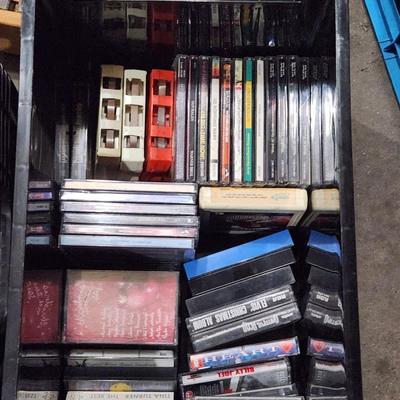 Sale Photo Thumbnail #161: Huge cassette CD and 8-track cartridge lot. 
Receive everything pictured. 
Great Artists such as Elvis, U2, Van Halen and many more.
