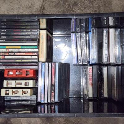 Sale Photo Thumbnail #163: Huge cassette CD and 8-track cartridge lot. 
Receive everything pictured. 
Great Artists such as Elvis, U2, Van Halen and many more.