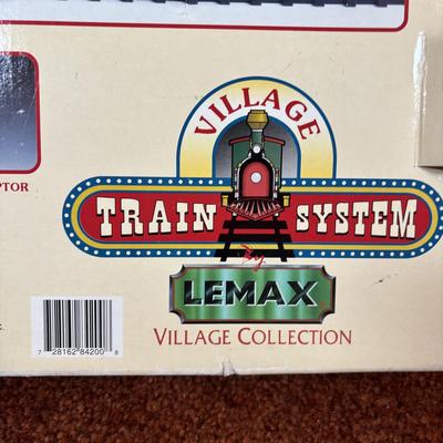 LOT 94: Vintage Wooden Childs Sled, Nutcracker Blow Mold (no light), Cast Iron Tree Stand and Lemax Village Train System