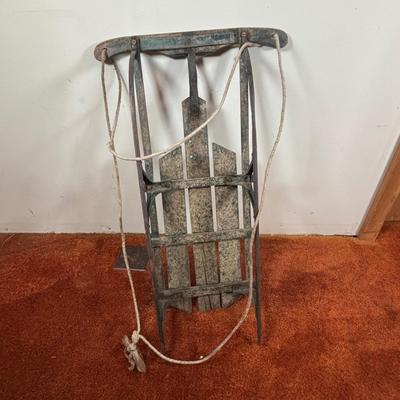 LOT 94: Vintage Wooden Childs Sled, Nutcracker Blow Mold (no light), Cast Iron Tree Stand and Lemax Village Train System
