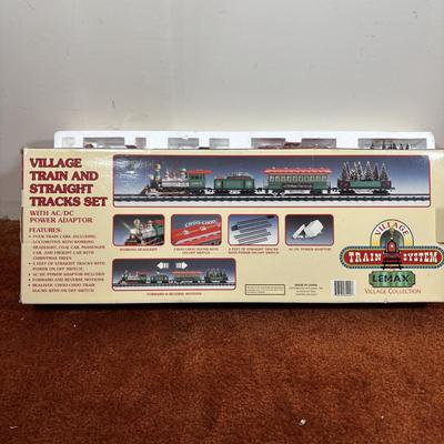 LOT 94: Vintage Wooden Childs Sled, Nutcracker Blow Mold (no light), Cast Iron Tree Stand and Lemax Village Train System