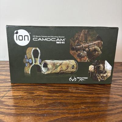LOT 105: Ion Sports Camera & Mounting Bracket