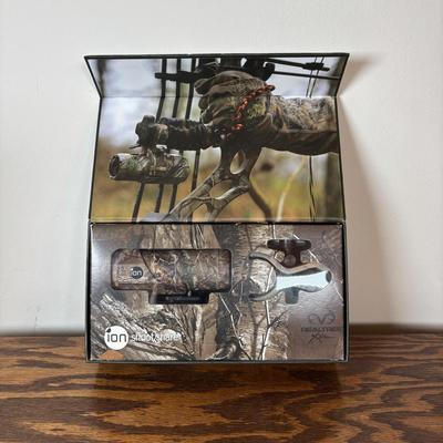 LOT 105: Ion Sports Camera & Mounting Bracket