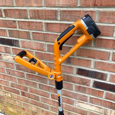 LOT 109: Worx Weed Trimmer / Edger with Wall Mount Battery Charger
