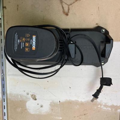 LOT 109: Worx Weed Trimmer / Edger with Wall Mount Battery Charger