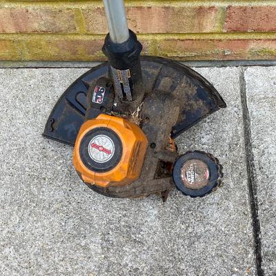 LOT 109: Worx Weed Trimmer / Edger with Wall Mount Battery Charger
