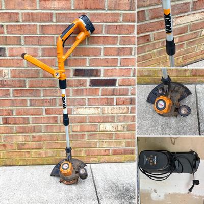LOT 109: Worx Weed Trimmer / Edger with Wall Mount Battery Charger