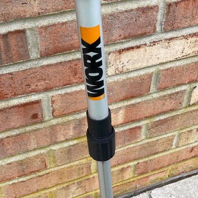 LOT 109: Worx Weed Trimmer / Edger with Wall Mount Battery Charger