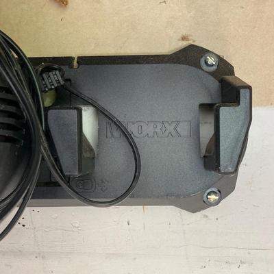LOT 109: Worx Weed Trimmer / Edger with Wall Mount Battery Charger