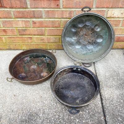 LOT 113: Heavy Duty Metal Hanging Kitchen Rack with Three Copper Bottom Pans