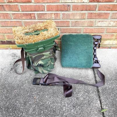 LOT 116: Primos Trigger Rifle Stick / Holder, Hunter's Seats (Woodstream and More), Ammo Box and "The Spirit Lives On"...