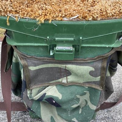 LOT 116: Primos Trigger Rifle Stick / Holder, Hunter's Seats (Woodstream and More), Ammo Box and "The Spirit Lives On"...