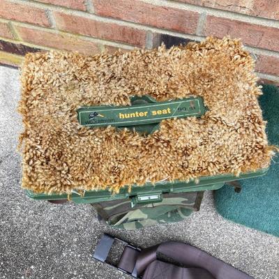 LOT 116: Primos Trigger Rifle Stick / Holder, Hunter's Seats (Woodstream and More), Ammo Box and "The Spirit Lives On"...