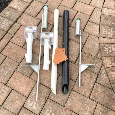 LOT 119: Fishing Nets, Fishing Pole Holders, Fish Filleting Boards, and Scales