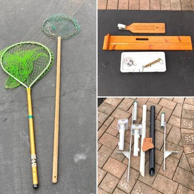 LOT 119: Fishing Nets, Fishing Pole Holders, Fish Filleting Boards, and Scales