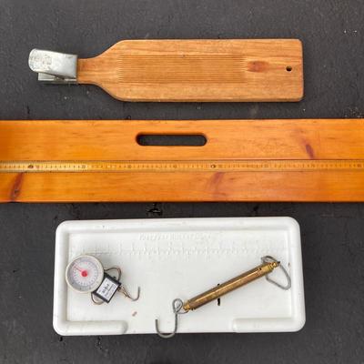 LOT 119: Fishing Nets, Fishing Pole Holders, Fish Filleting Boards, and Scales