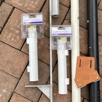 LOT 119: Fishing Nets, Fishing Pole Holders, Fish Filleting Boards, and Scales