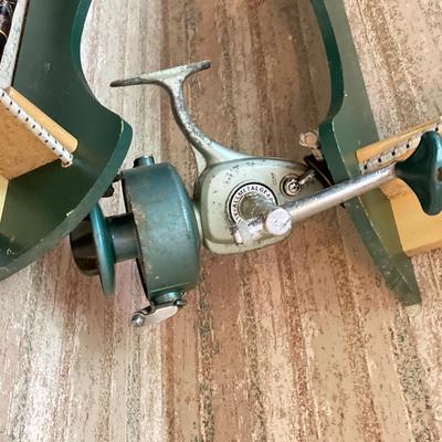 LOT 120: Wooden Fishing Rod Holder with Rods and Reels