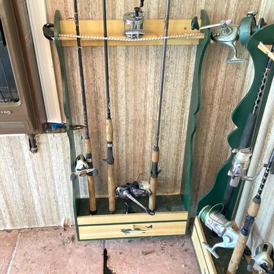 LOT 120: Wooden Fishing Rod Holder with Rods and Reels