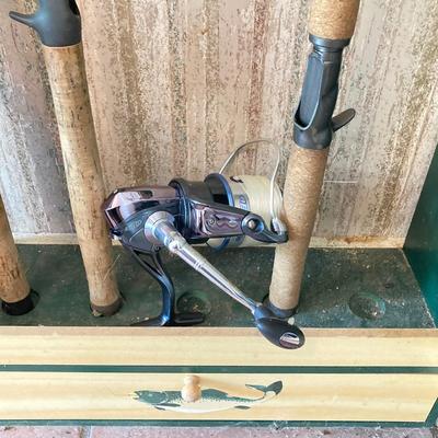 LOT 120: Wooden Fishing Rod Holder with Rods and Reels