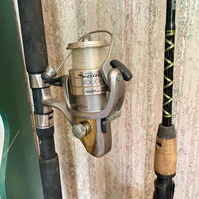 LOT 120: Wooden Fishing Rod Holder with Rods and Reels