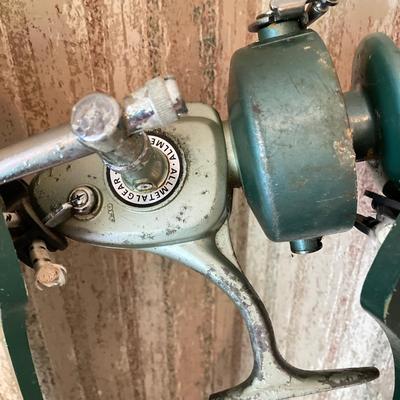 LOT 120: Wooden Fishing Rod Holder with Rods and Reels