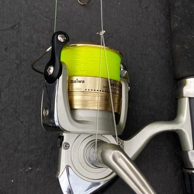 LOT 121: Fishing Rods, Reels by Penn and Daiwa and Other and a Tackle Box