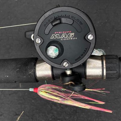 LOT 121: Fishing Rods, Reels by Penn and Daiwa and Other and a Tackle Box