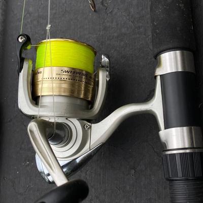 LOT 121: Fishing Rods, Reels by Penn and Daiwa and Other and a Tackle Box