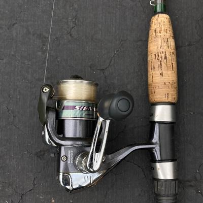 LOT 121: Fishing Rods, Reels by Penn and Daiwa and Other and a Tackle Box