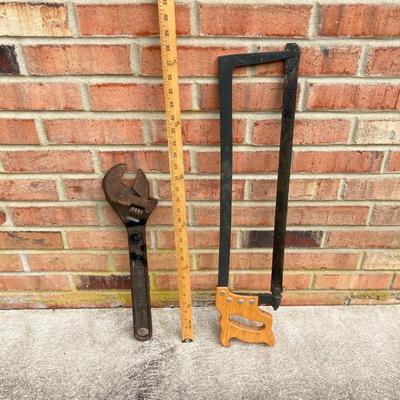 LOT 123: Collection of Tools Including a Plumber Wrench, Bolt Cutter Clamps, Saw, Extension Cord and Spool