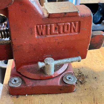 LOT 127: Wilton Bench Vise, Bosch Model 1608 Tool, Rockwell Laminate Trimmer Base Model 3991, Tap and Drill Bits and More