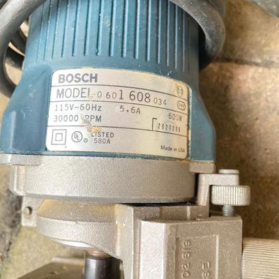 LOT 127: Wilton Bench Vise, Bosch Model 1608 Tool, Rockwell Laminate Trimmer Base Model 3991, Tap and Drill Bits and More