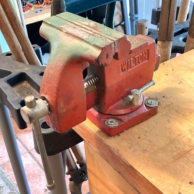 LOT 127: Wilton Bench Vise, Bosch Model 1608 Tool, Rockwell Laminate Trimmer Base Model 3991, Tap and Drill Bits and More