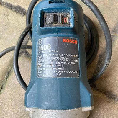 LOT 127: Wilton Bench Vise, Bosch Model 1608 Tool, Rockwell Laminate Trimmer Base Model 3991, Tap and Drill Bits and More
