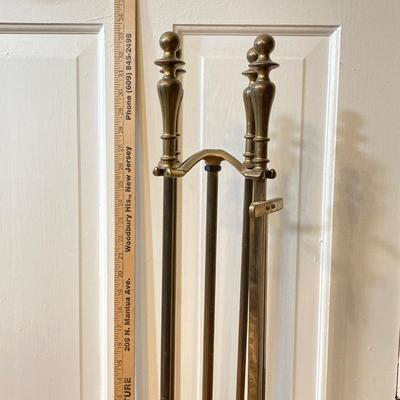 LOT 130: Brass Trimmed Fireplace Screen with Brass Fireplace Tools / Stand
