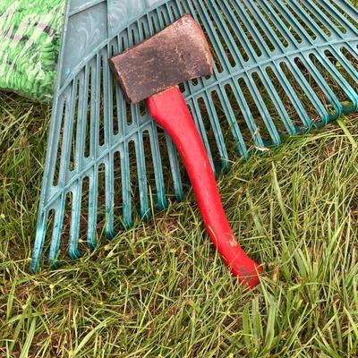 LOT 133: Gardening Tools Including Rakes, Seed Spreader, Ax, Hose and More