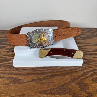 LOT 138: Rodeo Cowboy Belt Buckle w/Leather Belt & Uncle Henry Schrade Pocket Knife