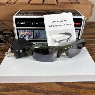 LOT 141: Fishing & More Collection: Bushnell Binoculars Mobile Eyewear Recorder, Fishing Reels, Realistic Weather Band Radio, Wooden...