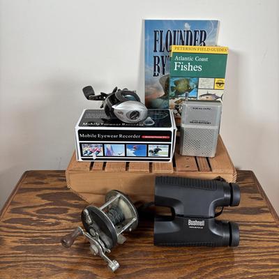 LOT 141: Fishing & More Collection: Bushnell Binoculars Mobile Eyewear Recorder, Fishing Reels, Realistic Weather Band Radio, Wooden...