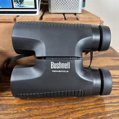 LOT 141: Fishing & More Collection: Bushnell Binoculars Mobile Eyewear Recorder, Fishing Reels, Realistic Weather Band Radio, Wooden...