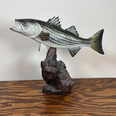 LOT 142: Outdoor Life Collection: Made in USA Belt Buckle, Danbury Mint Collectors Plate, Binoculars, Fishing Reel & Resin Striped Bass
