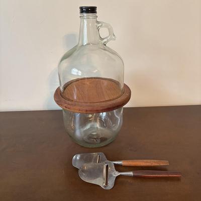 LOT 145: Revolving Liquor Caddy, Hand Crafted Cheese & Cracker Jug, Oversize Stell Artois & Champagne Glasses