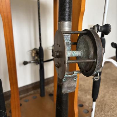 LOT 146: Fishing Rod Holder w/Fishing Rods & Reels