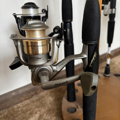 LOT 146: Fishing Rod Holder w/Fishing Rods & Reels