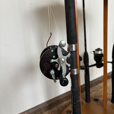 LOT 146: Fishing Rod Holder w/Fishing Rods & Reels