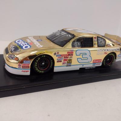 Sale Photo Thumbnail #795: Race Fans Limited Edition Double Plated 24K Gold Dale Earnhardt #3 Oreo GM Goodwrench 2001 Monte Carlo with Original Box
