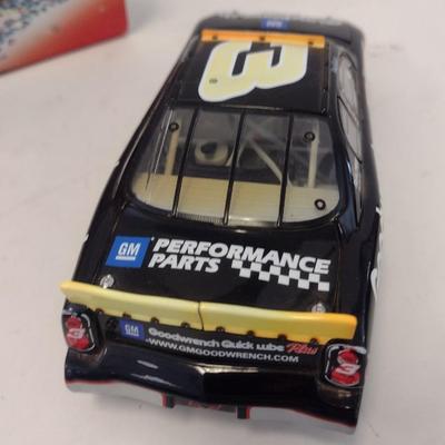 Sale Photo Thumbnail #938: Action Racing No Bull Limited Edition Dale Earnhardt 76th Win 2000 Monte Carlo GM Goodwrench with Original Box.  No Bull edition is replica condition of finish line car.
